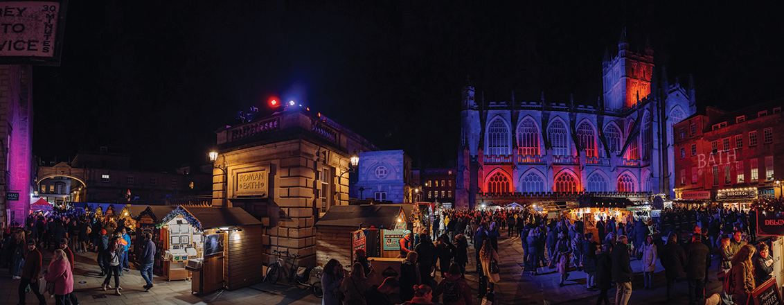 A panoramic view of Bath Christmas Market at night