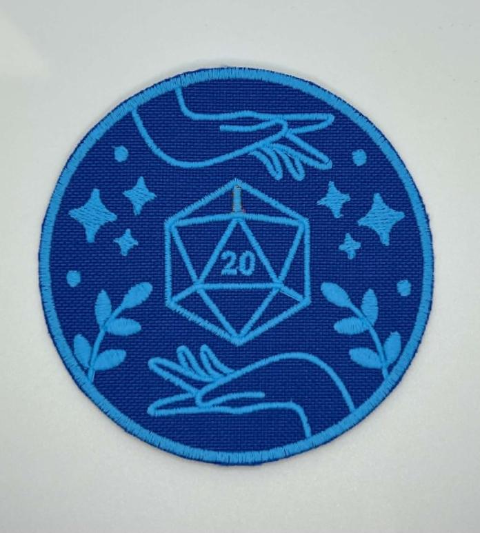Embroidered blue badge with pattern