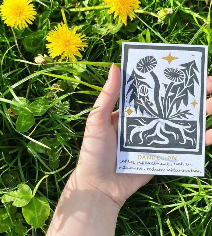art in hand over grass