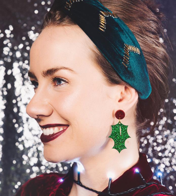 Lady with holly earrings