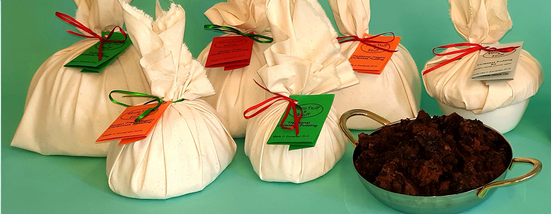 christmas puddings wrapped in white cloth